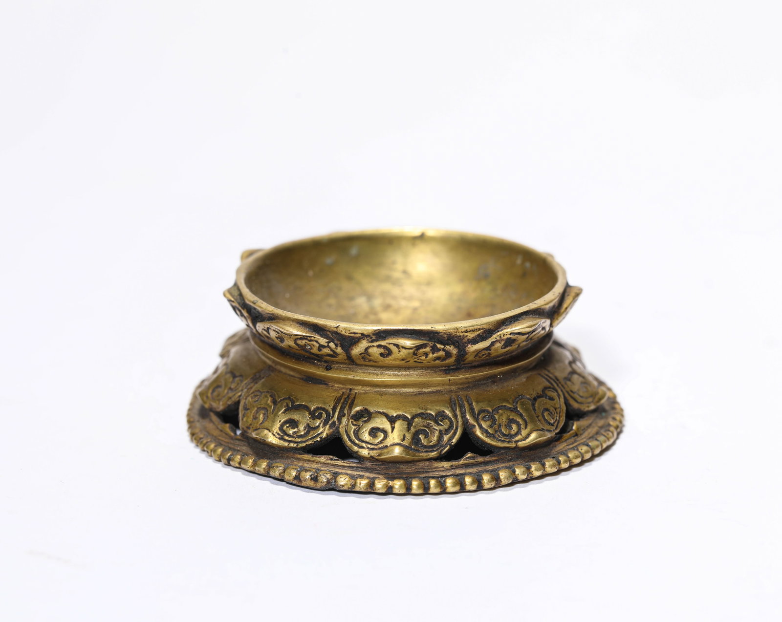 A Gilt-Bronze Incense Holder: A Gilt-Bronze Incense Holder Dimensions: Weight: 100g. Width: 6.7 cm (2.64 in) x Height: 2.3 cm (0.91 in). All measurements are approximate.