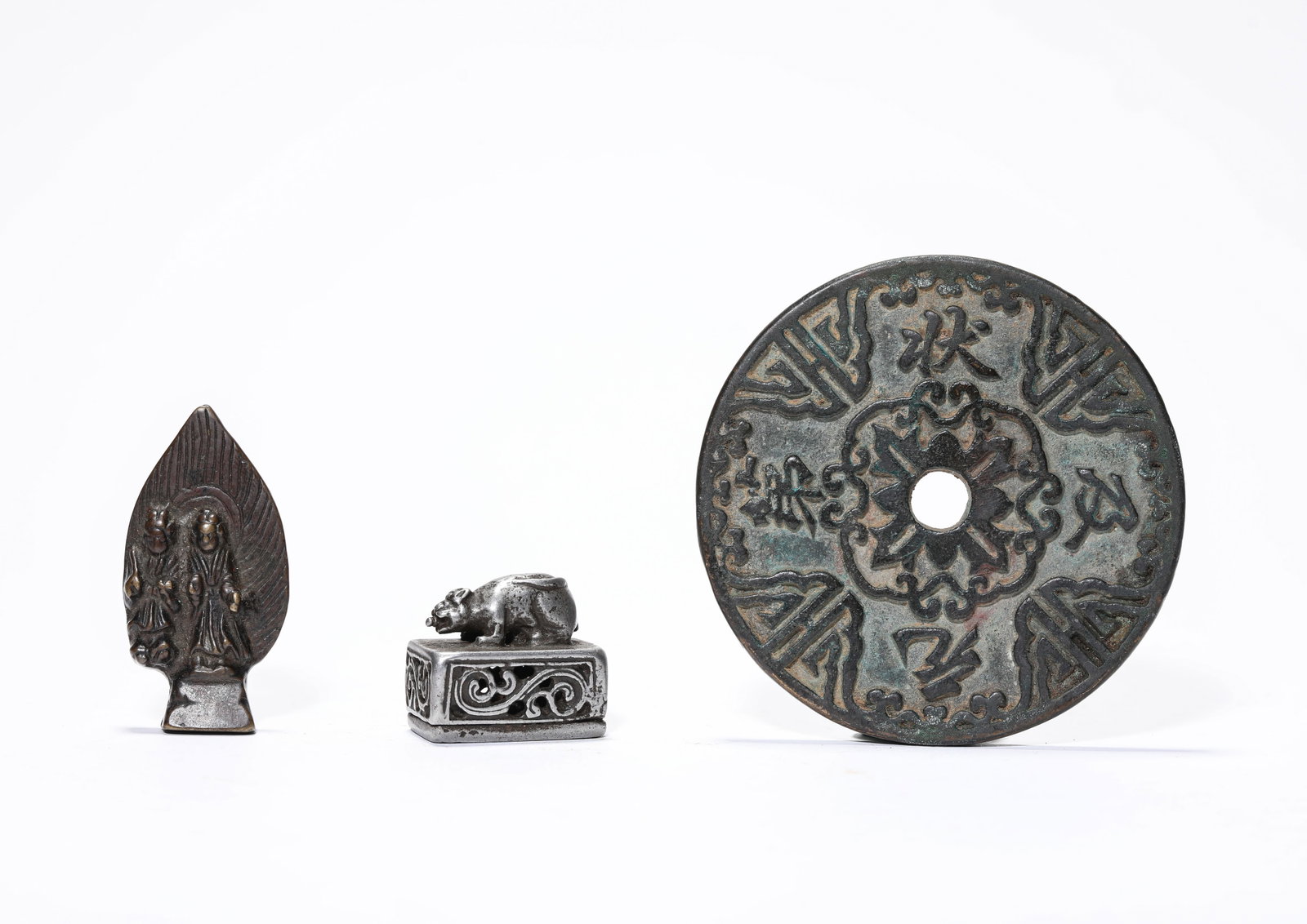 A Group of Bronze Objects: A Group of Bronze Objects Dimensions: Weight: 180g. Width: 7.4 cm (2.91 in) x Height: 2.5 cm (0.98 in) x Height: 5.0 cm (1.97 in). All measurements are approximate. (?:????????"??",????????????