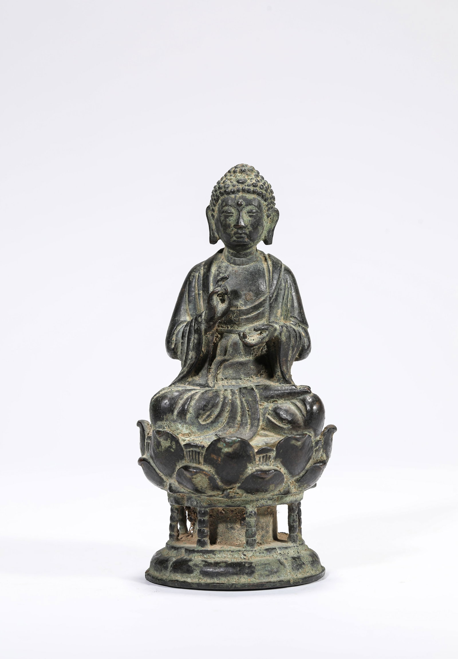 A Bronze Figure of Shakyamuni: A Bronze Figure of Shakyamuni Dimensions: Weight: 1069g. Width: 7.7 cm (3.03 in) x Height: 16.0 cm (6.30 in). All measurements are approximate.