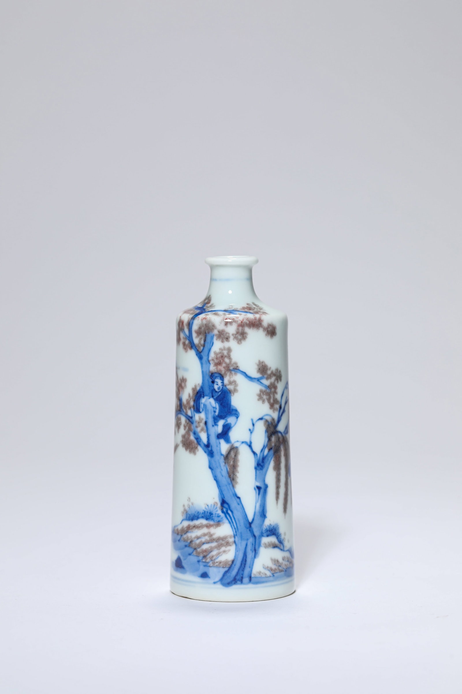 A Blue and White and Underglaze-Red 'Figural' Snuff Bottle: A Blue and White and Underglaze-Red 'Figural' Snuff Bottle Dimensions: Height: 10.0 cm (3.94 in). All measurements are approximate.