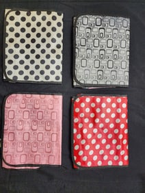LOT OF FOUR PATTERN ACCESSORY TRAVEL BAGS