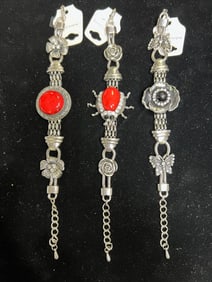 ANTIQUE SILVER CHARM BRACELET WITH GEMSTONE ACCENTS