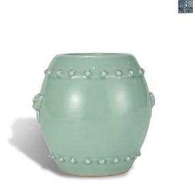 Qing Dynasty Qianlong period Bean-green glaze jar with animal-mask handles and nailhead decoration