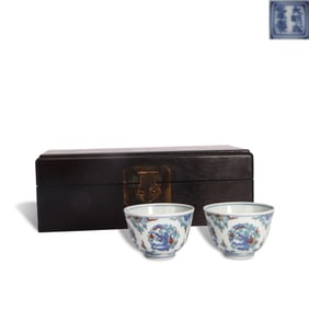 Ming Dynasty Chenghua period, A pair of Doucai cups with clustered flower and kui-dragon patterns