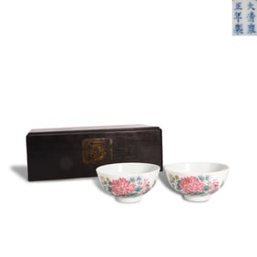 Qing Dynasty Yongzheng period, A pair of famille rose tea cups with floral patterns and poems