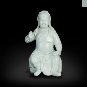 Ming Dynasty Dehua kiln white-glazed seated statue of Guan Yu, made by He Chaozong