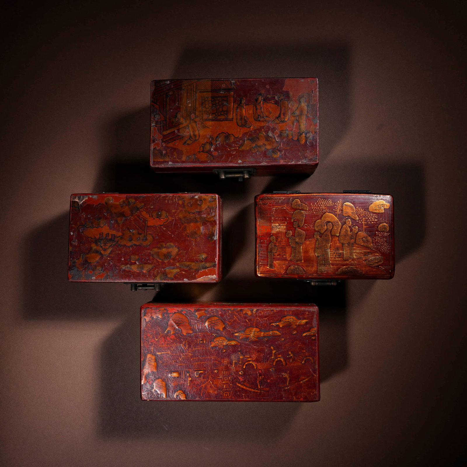 A set of four story boxes with clear vermilion and painted gold characters. (1 of 5)