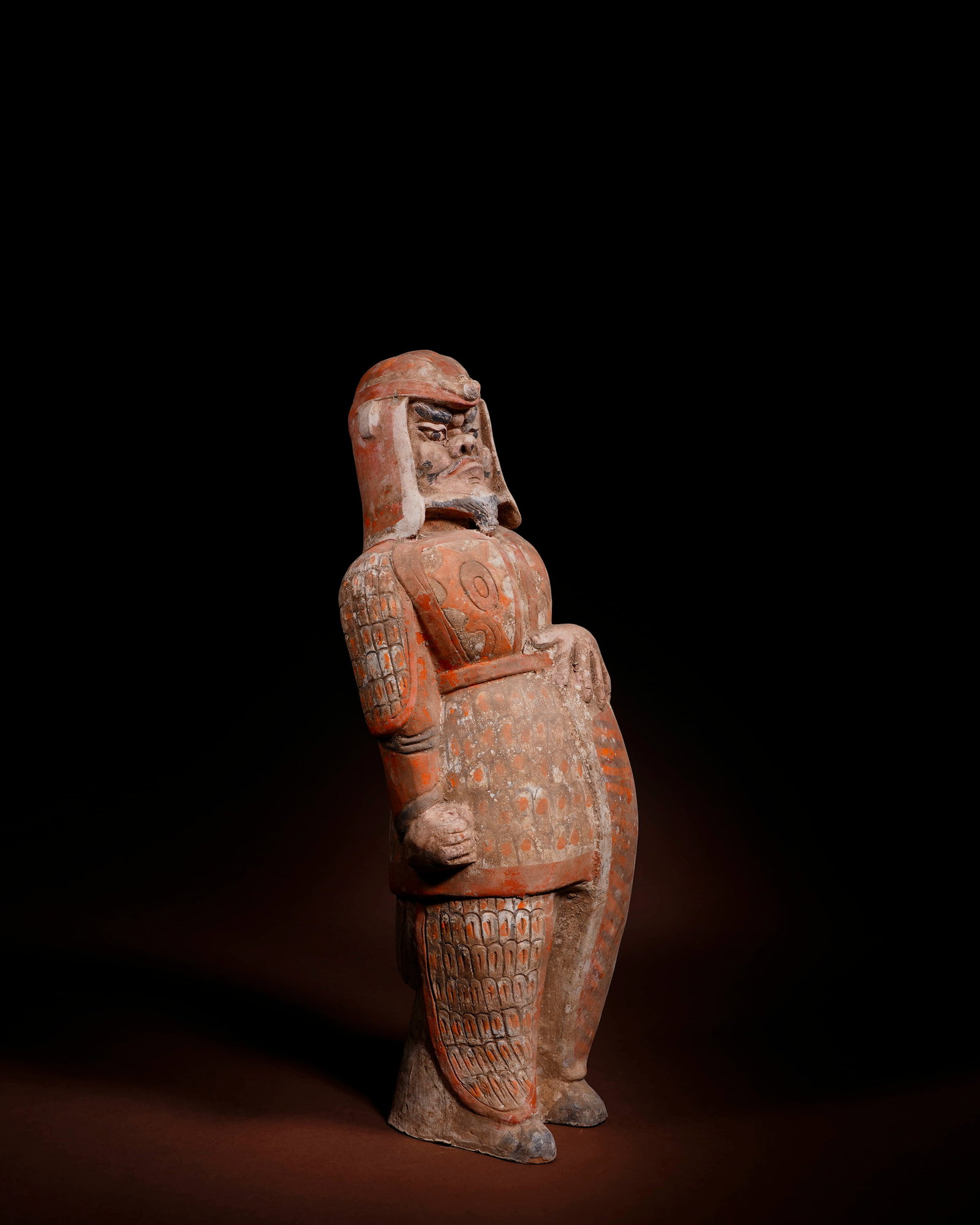 A red painted pottery standing armoured warrior with a shield, Northern Qi Dynasty - 2
