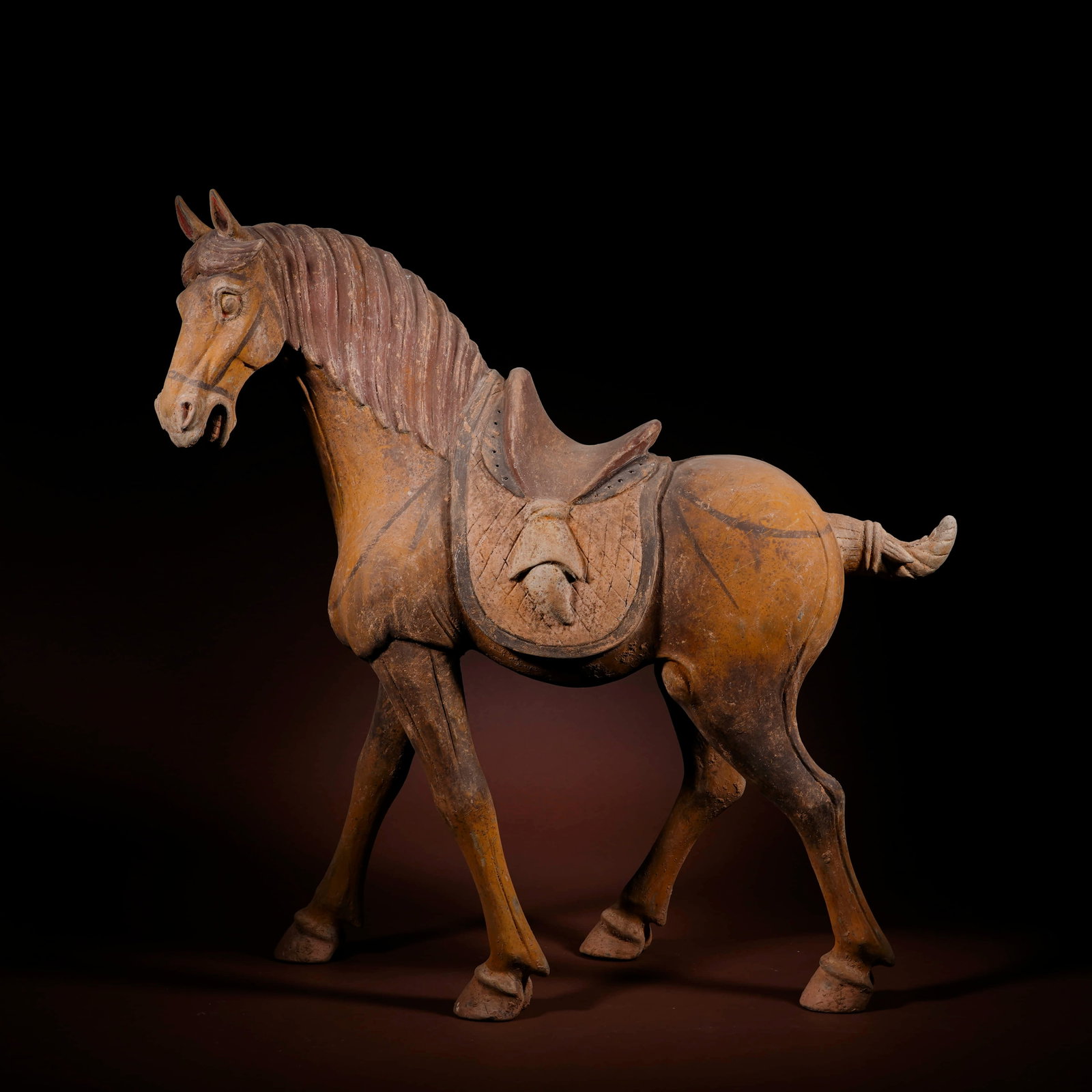 A Large chestnut painted pottery walking horse, Tang Dynasty,TL tested - 2