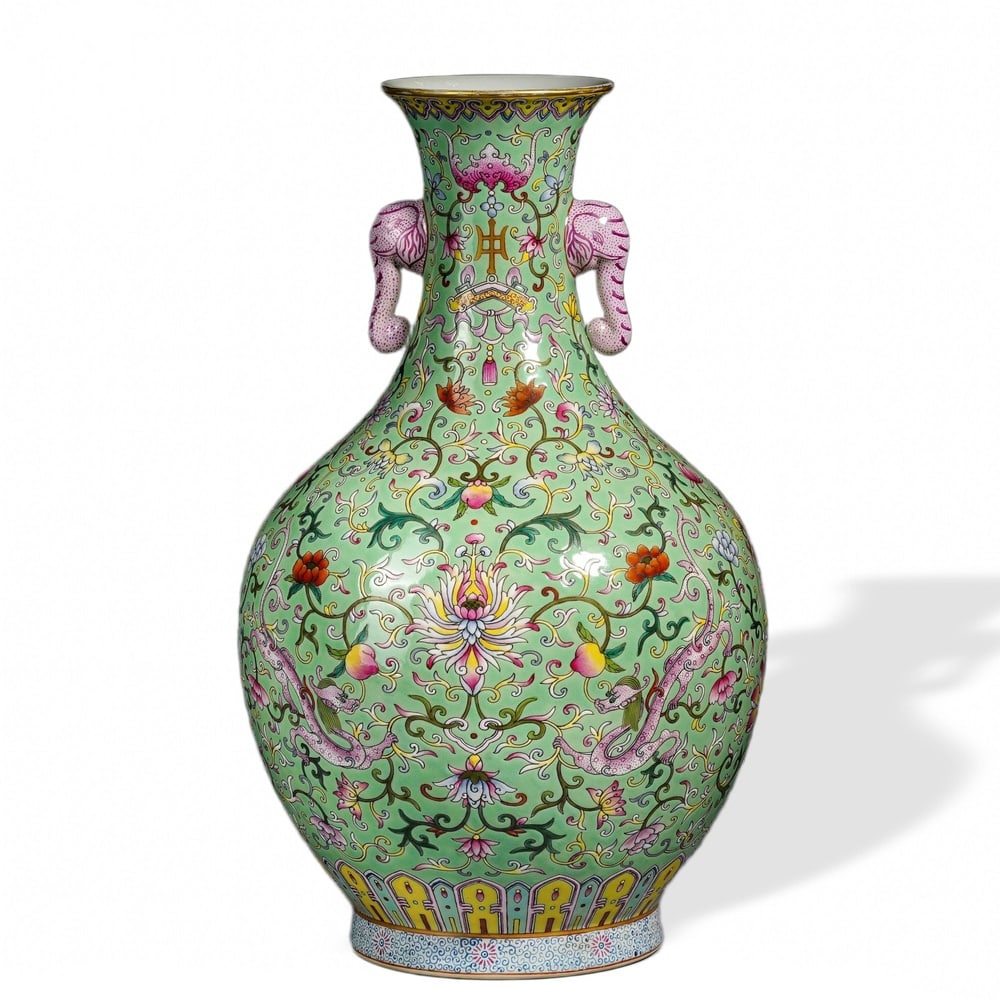 QIANLONG FAMILLE ROSE 'WESTERN LOTUS SCROLL' VASE WITH ELEPHANT HANDLES ON GREEN GROUND (1 of 3)