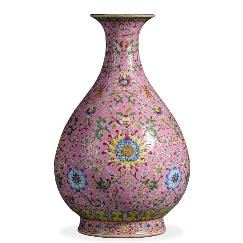 QIANLONG FAMILLE ROSE 'BROCADE-WITH-ADDED-FLOWERS' YUHUCHUN VASE ON PINK GROUND: Qianlong Famille Rose 'Brocade-with-Added-Flowers' Yuhuchun Vase on Pink Ground Dimensions: H: 12 in (30.5 cm); W: 7 in (18 cm) This handsomely proportioned yuhuchun vase exemplifies one of the most a