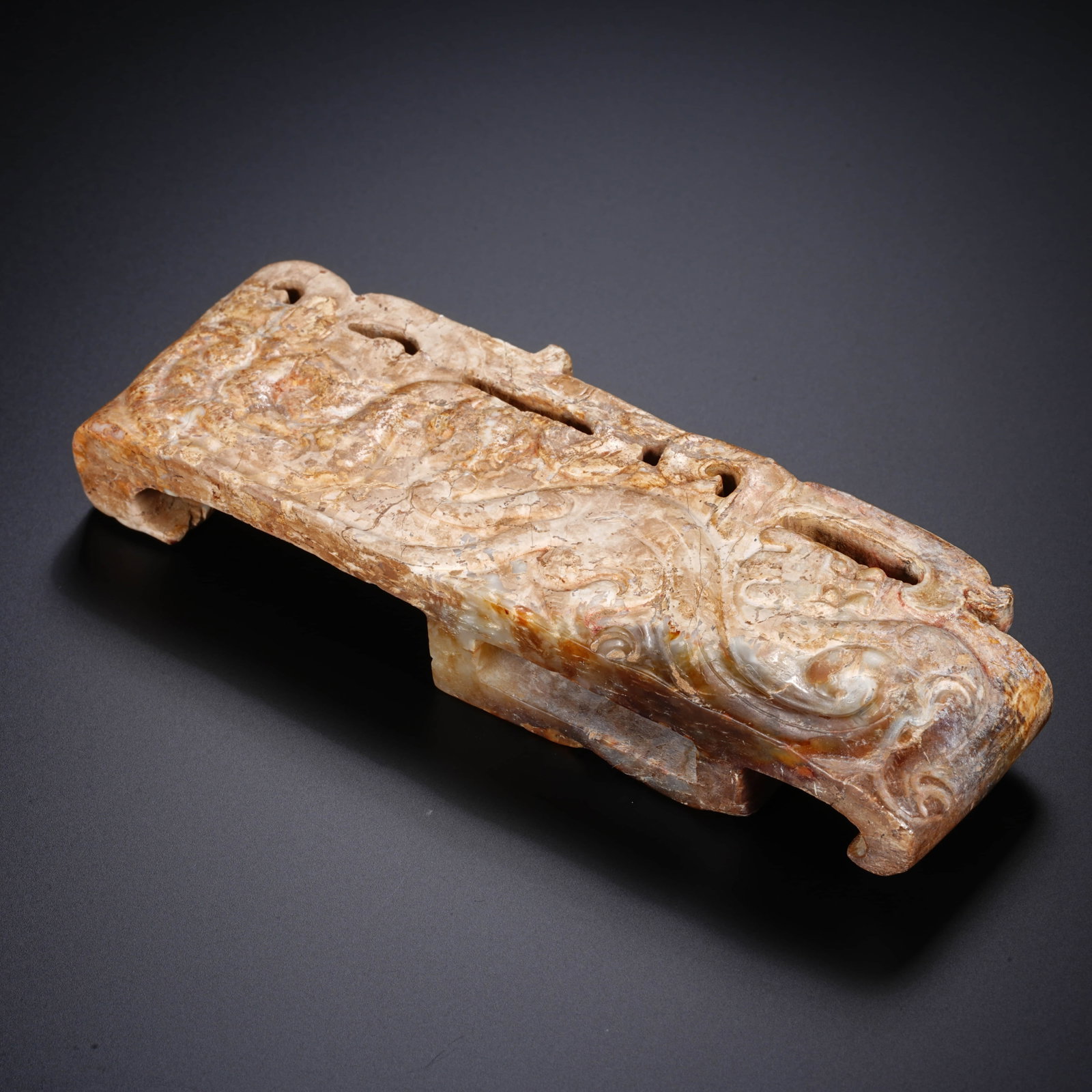 A CHINESE JADE SWORD FITTING (1 of 7)