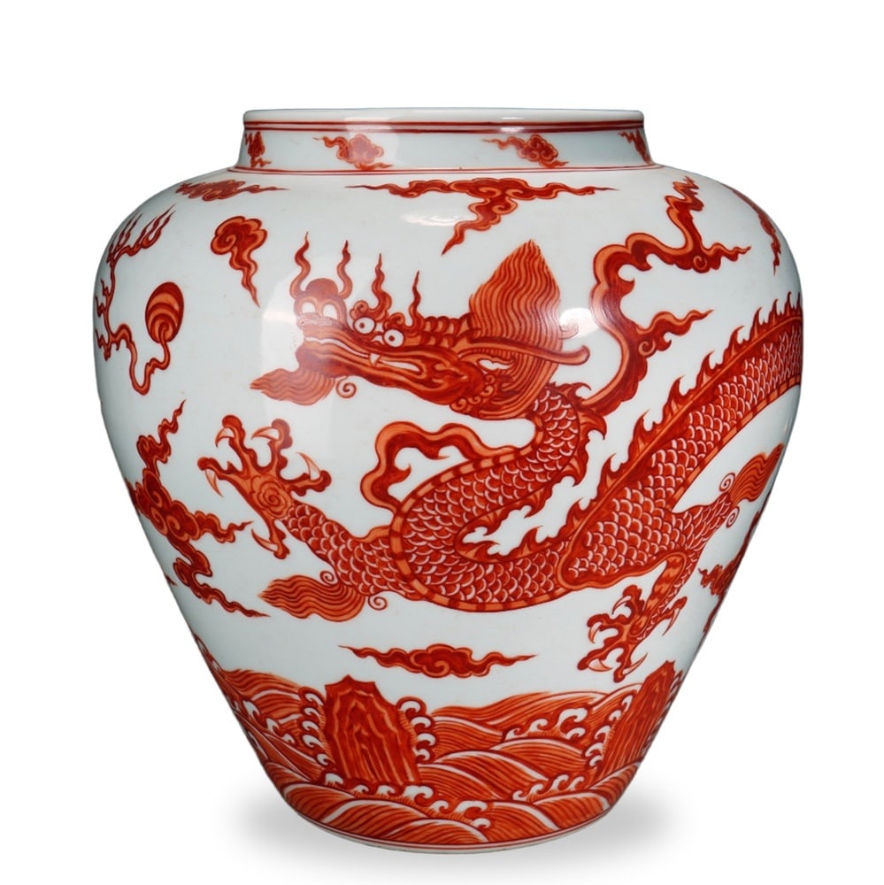 MING XUANDE PERIOD IRON-RED 'DRAGON AMONG AUSPICIOUS CLOUDS' JAR (1 of 3)