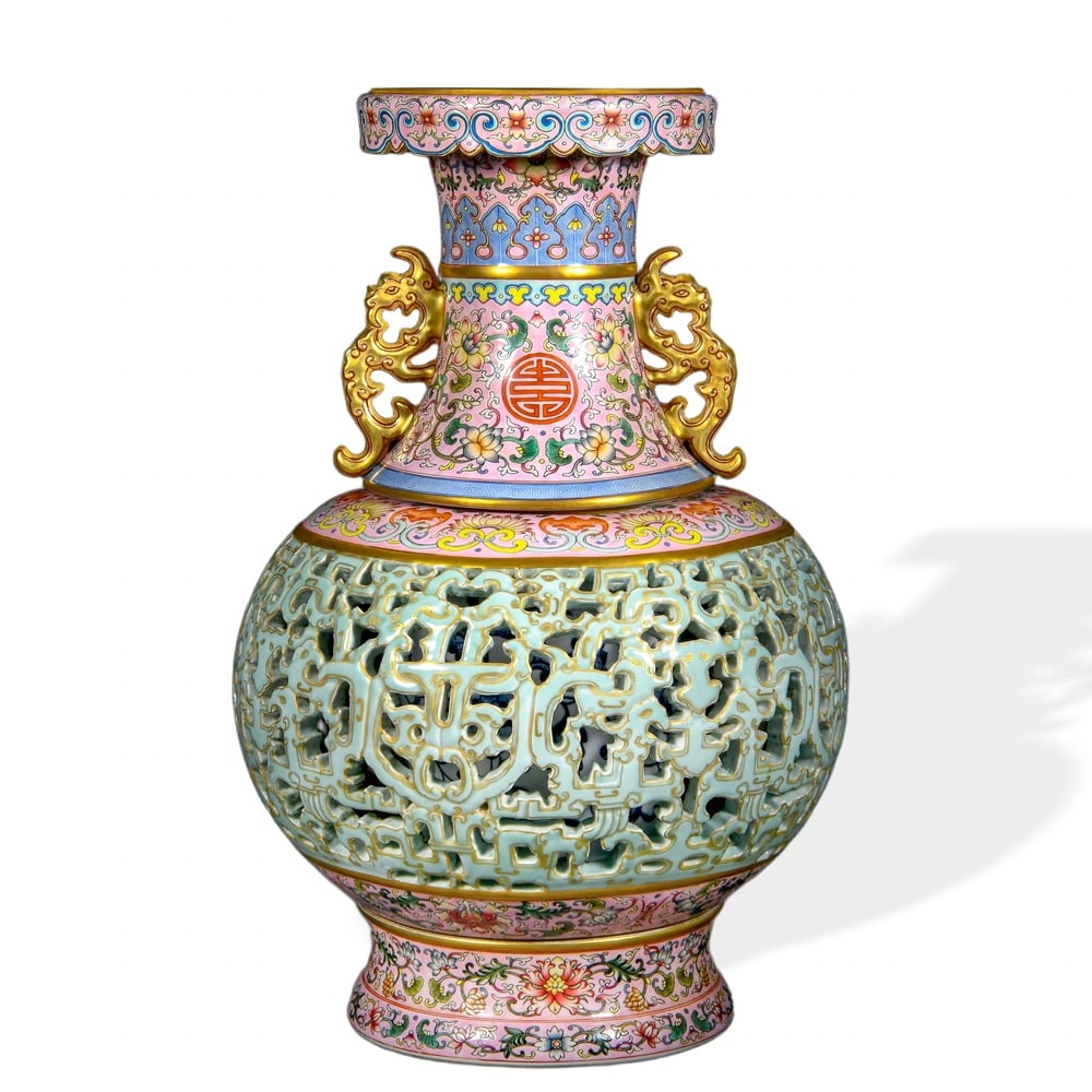 QIANLONG RETICULATED REVOLVING VASE WITH FAMILLE ROSE EXTERIOR, UNDERGLAZE BLUE INTERIOR, AND CARVED (1 of 3)
