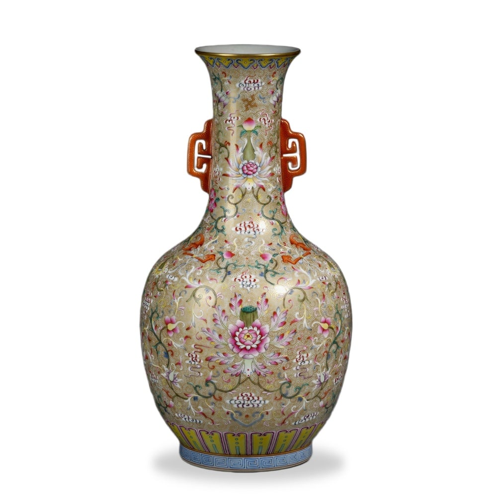 QIANLONG FAMILLE ROSE 'WESTERN LOTUS AND BATS' TWIN-HANDLED VASE ON GILT SGRAFFITO GROUND (1 of 3)
