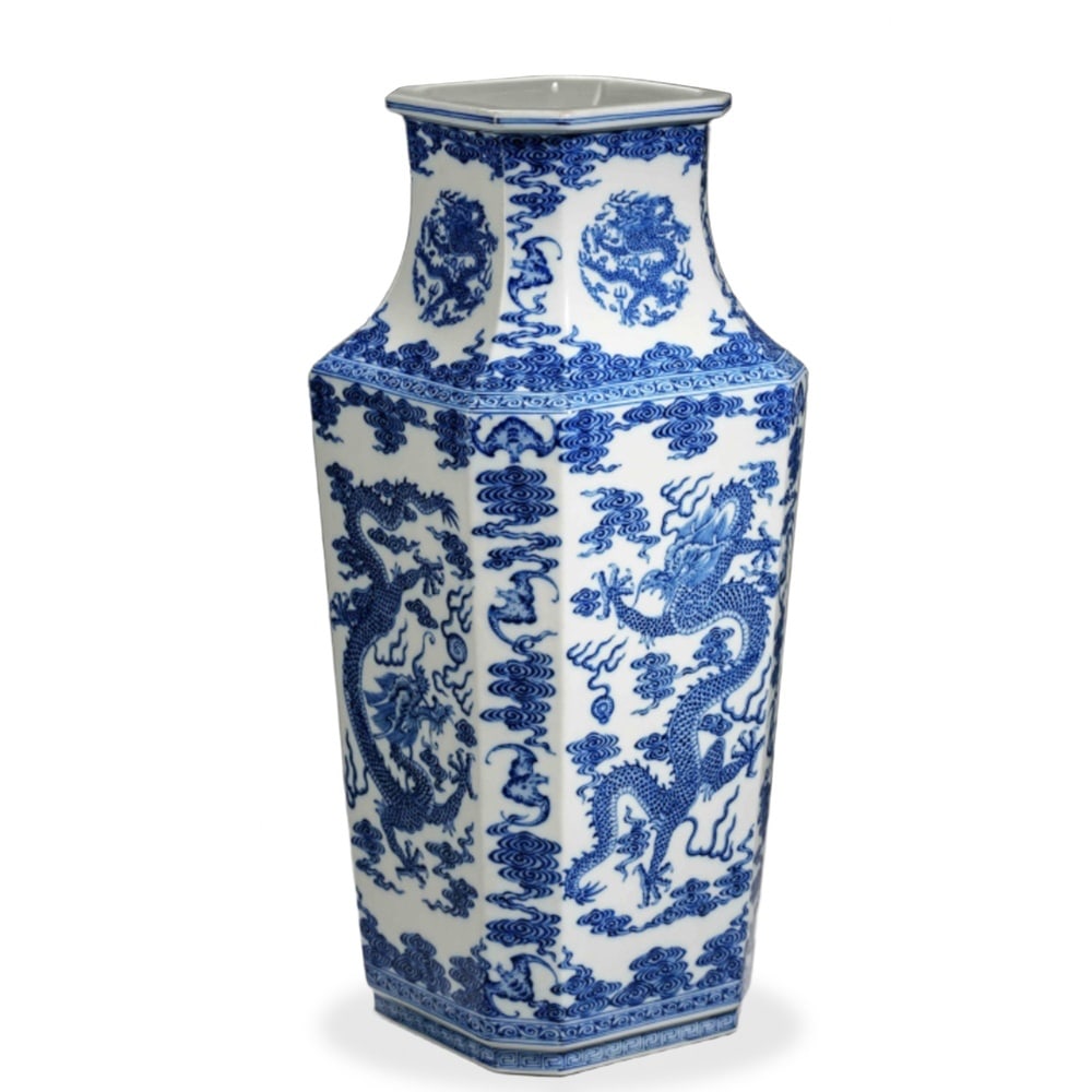 QIANLONG BLUE AND WHITE 'DRAGONS CHASING THE PEARL' SQUARE-SECTION VASE: Qianlong Blue and White 'Dragons Chasing the Pearl' Square-Section Vase Dimensions: H: 18 1/8 in (46 cm); W: 7 3/4 in (19.5 cm) This handsome vase exemplifies one of the most architecturally