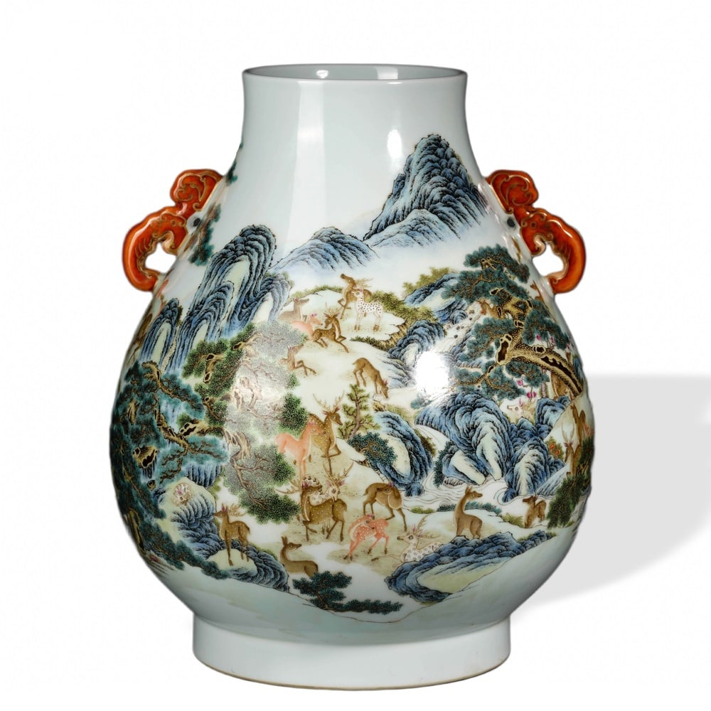 QIANLONG FAMILLE ROSE 'HUNDRED DEER' ZUN WITH IRON-RED CHILONG HANDLES: Qianlong Famille Rose 'Hundred Deer' Zun with Iron-Red Chilong Handles Dimensions: H: 17 3/4 in (45 cm); W: 16 1/2 in (42 cm) This monumental zun is among the most ambitious famille rose forms produce