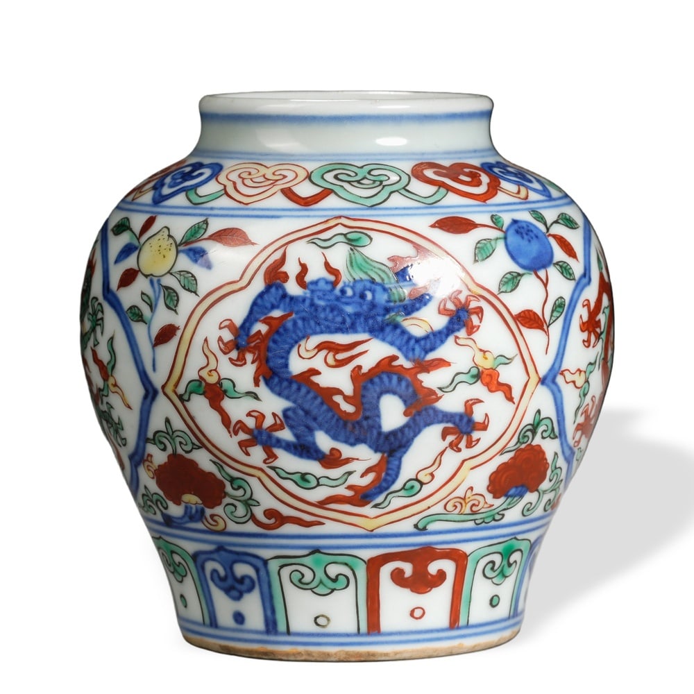 MING JIAJING WUCAI 'DRAGON MEDALLION AND AUSPICIOUS FRUITS' JAR (1 of 3)