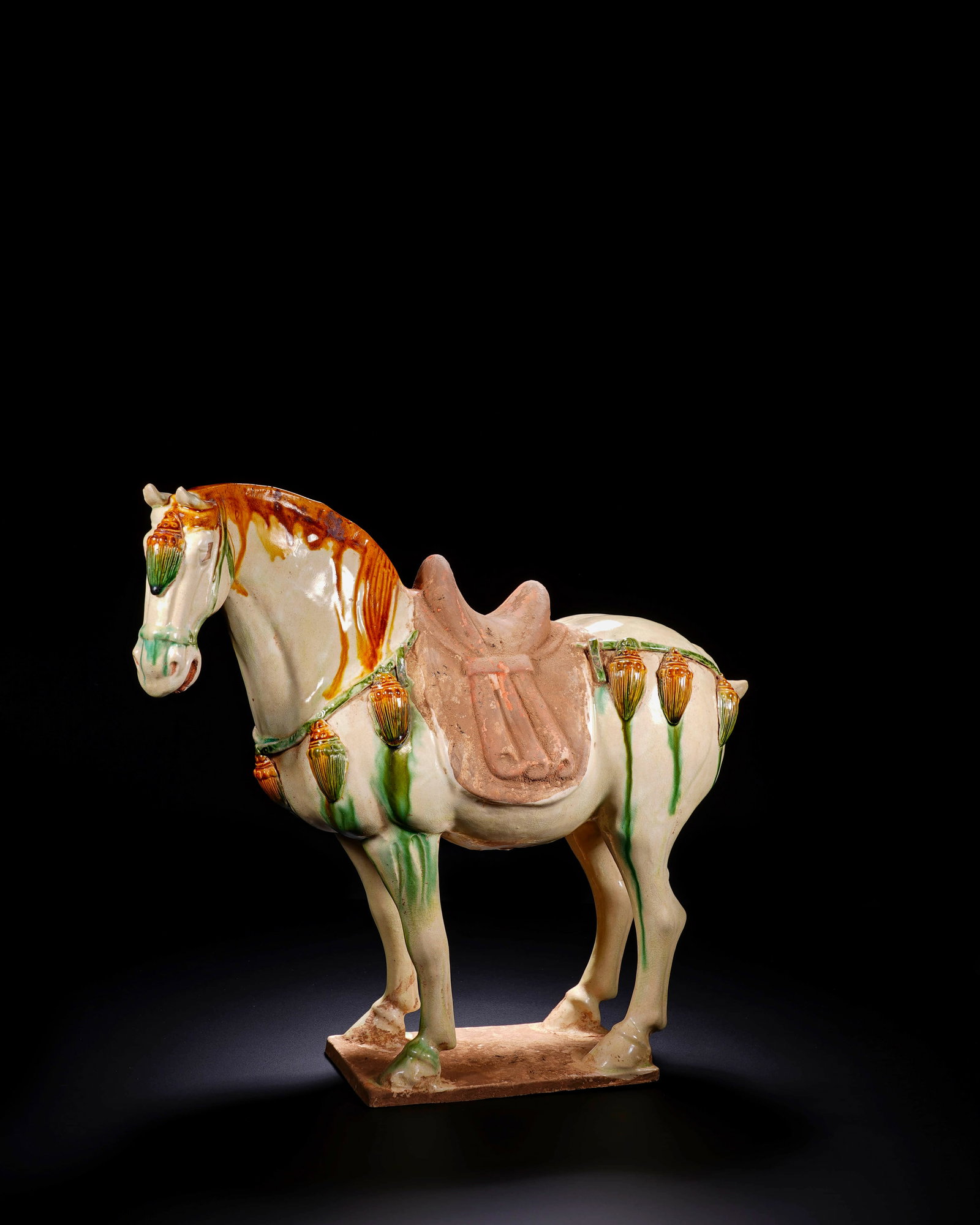 Tang tri-colored glazed pottery pommel horse: L:33cm H:29.7cm