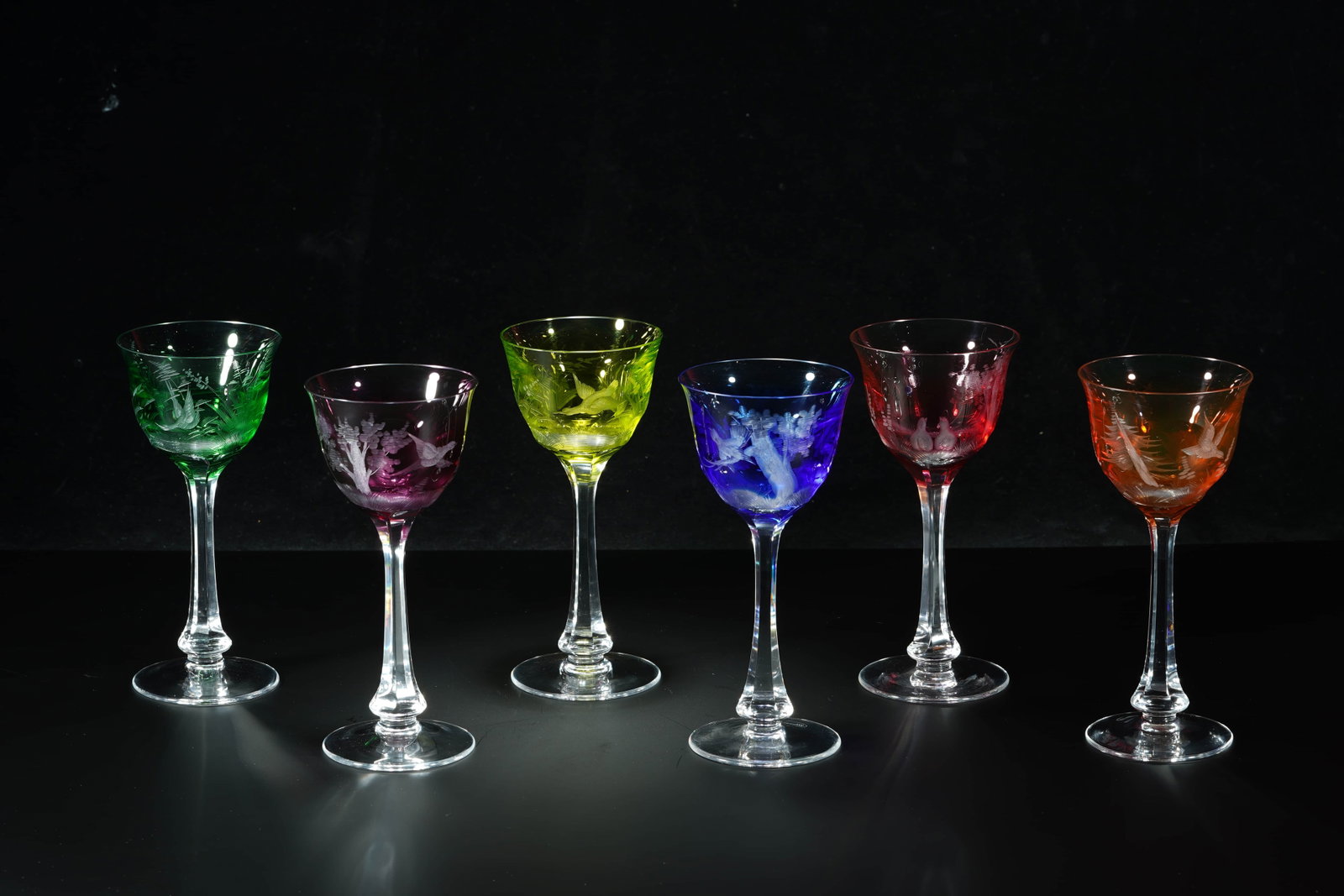 These six Art Nouveau Czech MOSER crystal colored goblets: Year: 1980s.Style: Art Nouveau styleMaterial: crystal glassBrand logo: MOSER (see bottom)Size: height 18 cmOrigin: MOSER Crystal Factory, Czech Republic (1857-present)Introduction: These six Czech MOS