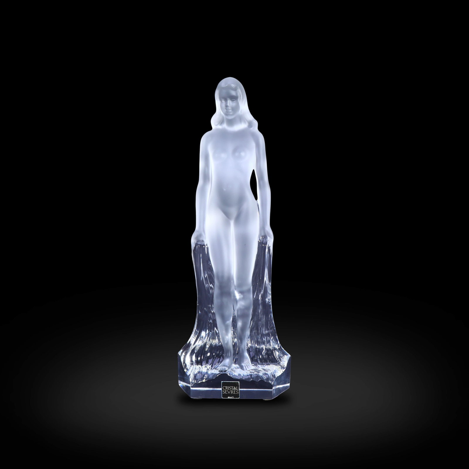 This crystal sculpture shows the goddess Venus taking a bath in ancient Roman mythology.: Age: Early 20th century.Style: Art Nouveau styleMaterial: crystalSize: height 27.5cm.Origin: Royal Sepfler Crystal Factory, Paris, France (1750-present)Introduction: This crystal sculpture shows the g