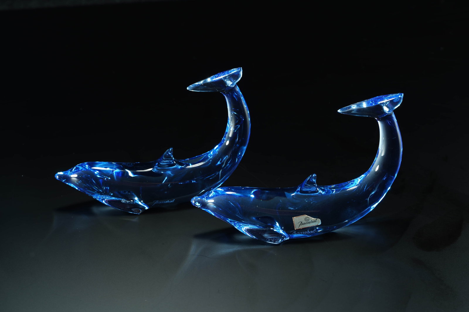 Baccarat is the most famous French luxury brand Crystal Glass Dolphin.: Year: 1990s.Style: Art Deco styleMaterial: crystal glassSize: length 11 cm, height 10 cmOrigin: Royal Crystal Factory, Baccarat, France (1764-present)Introduction: These two dolphin ornaments are beau