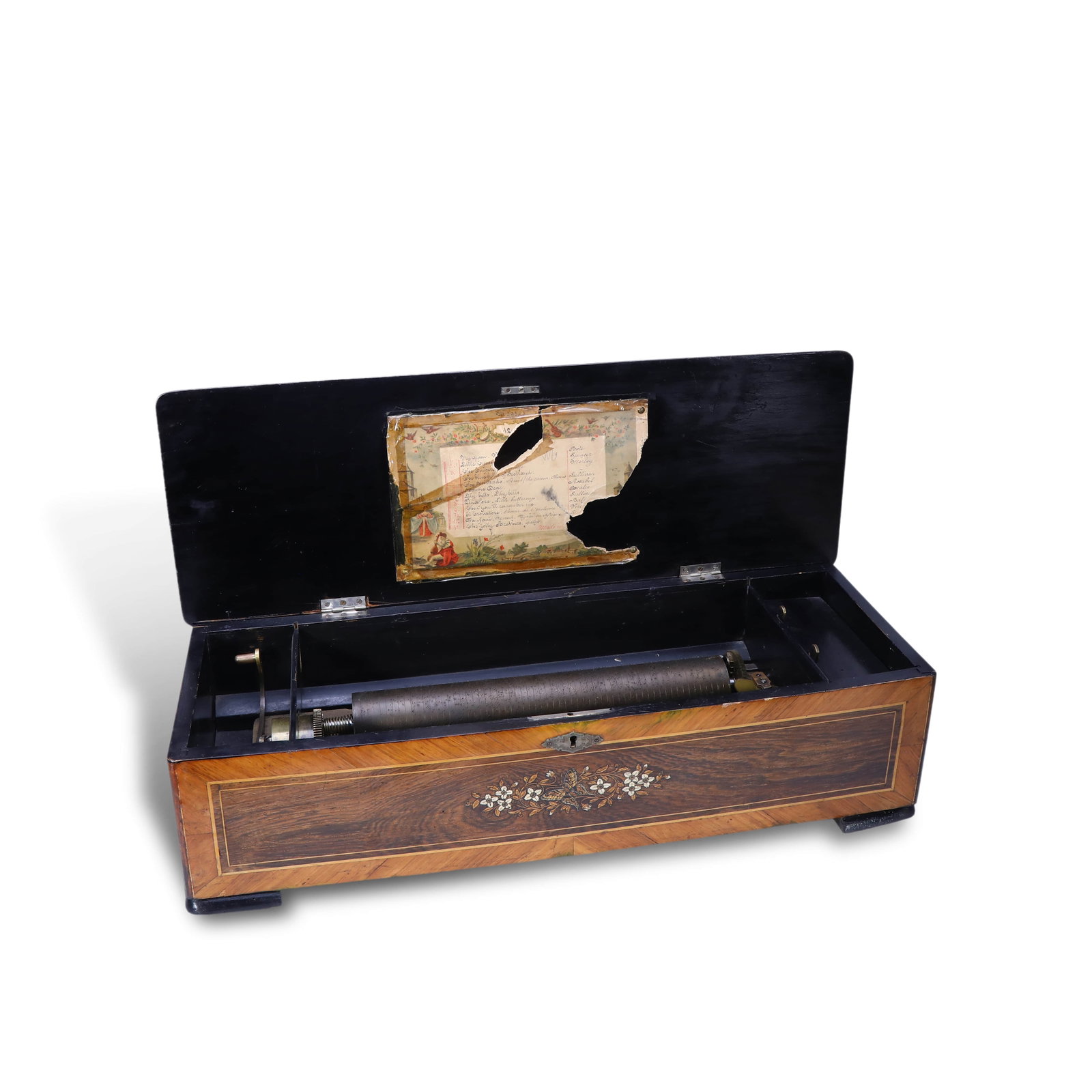 A twelve-piece mechanical music box: Name: a mechanical music box with twelve pieces of music.Year: Late 19th centuryProduction number: 29848 (see the inner box cover)Material: ebony, precious wood, brassSize: brass roller is 34cm long, 