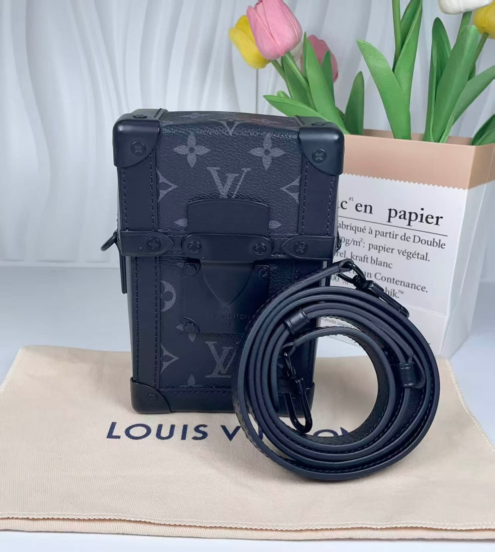 Louis Vuitton. Vertical Trunk Box Crossbody Bag: Louis Vuitton. Vertical Trunk box Crossbody bag black and gray presbyopic canvas with cowhide corner lock equipped with original adjustable shoulder strap vintage hard box shape recognition full size 