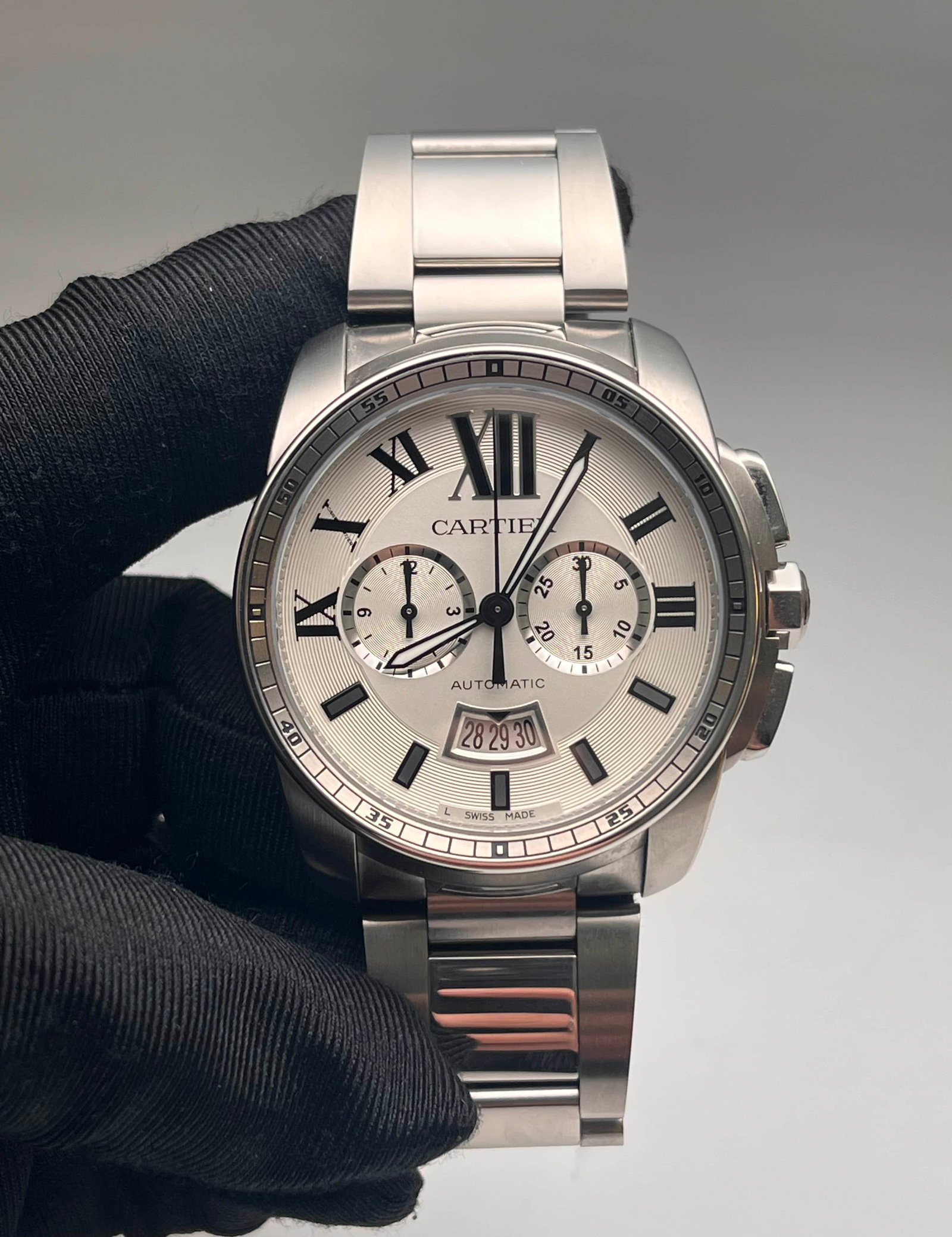 Cartier CALIBRE DE CARTIER W7100045 large 23-year-old men's automatic mechanical chronograph: Cartier CALIBRE DE CARTIER W7100045 large 23-year full set of men's automatic mechanical chronograph 42mm fine steel case octagonal crown inlaid with synthetic spinel silver-plated pearlescent spiral 