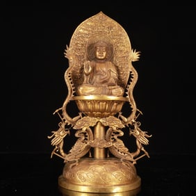 A Rare Gilt Bronze Statue of Sakyamuni