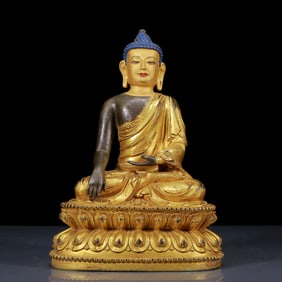 A Solemn Gilt Bronze Statue of Sakyamuni