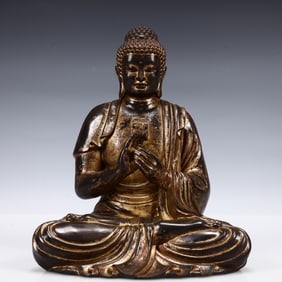 A Solemn Gilt Bronze Statue of Sakyamuni