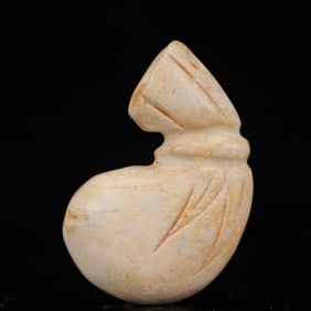 An Archaic Hongshan Culture Yellow Jade Lucky Dag Pendant