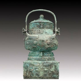 A Precious Bronze Beast-Face Pattern Pot with Cover ,With Inscription