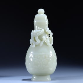 An Exquisite White Jade Beast-Face and Dragon Pattern Bottle