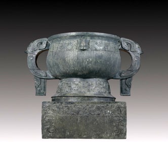 A precious bronze double-eared stove with auspicious animal patterns