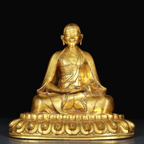A Rare Gilt Bronze Statue of Guru
