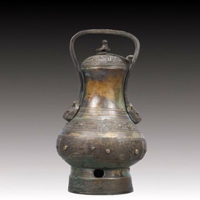 A Precious Bronze Beast-Face Pattern Bottle