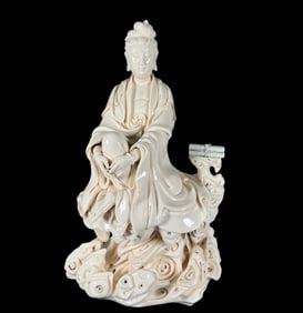 A Solemn Blance-De-Chine Statue of Avalokitesvara