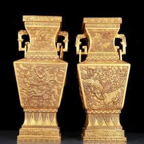 A pair of huge gilt bronze bottles with dragon and phoenix patterns on both ears