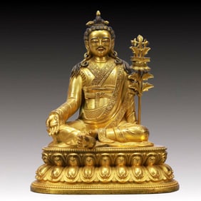 A Solemn Gilt Bronze Statue of Padma Sambhava