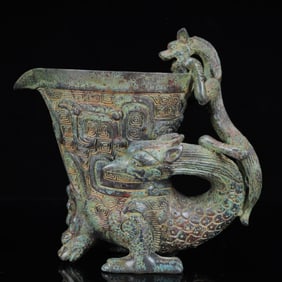 An Archaic Bronze Dragon Cup
