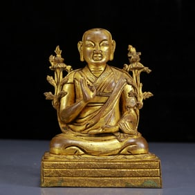 A Solemn Gilt Bronze Statue of Guru