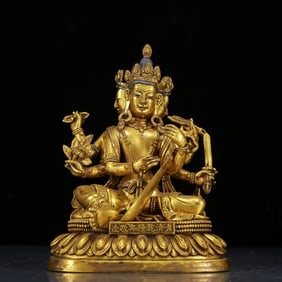 A Solemn Gilt Bronze Statue of Six-Armed Manjusri