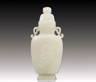 An Exquisite White Jade 'Flower' Vase And Cover