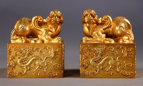 A Set of Fine Gilt Bronze Auspicious Cloud and Dragon Pattern Seals