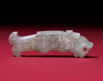 An Exquisite White Jade Dragon-Fish Pendant
