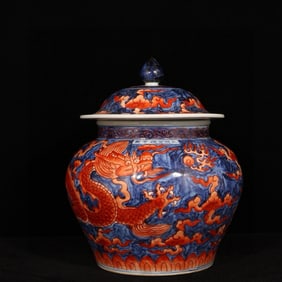 An Exquisite Iron-Red Glazed Blue and White Auspicious Cloud and Dragon Pattern Cover Jar