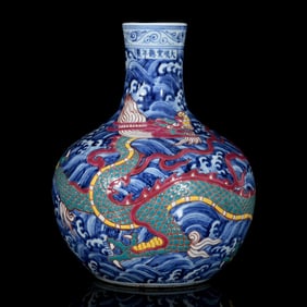 An Exquisite Blue and White Wucai Seawater and Dragon Pattern Vase
