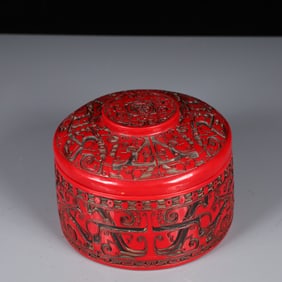 An Exquisite Carved Red Lacquer Beast-Face Pattern Box with Cover